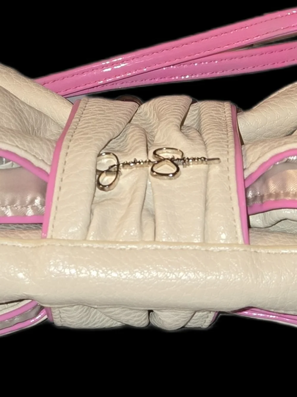 Elegant Cream Kiss-Lock Clutch with Pink Trim By Jessica Simpson. Flawless.